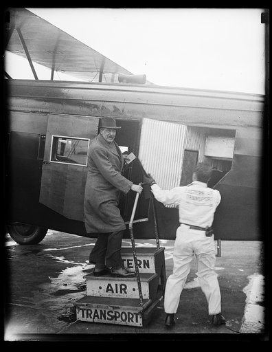 Man at airplane door