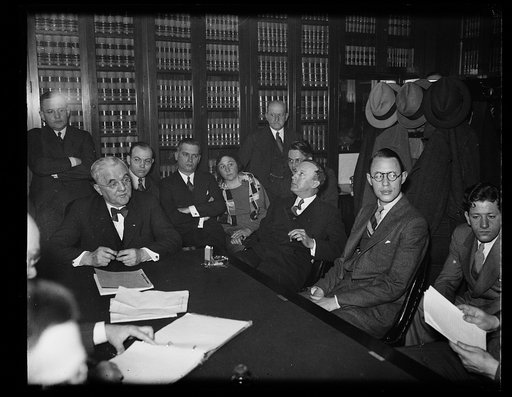 Group; George Norris at head of table