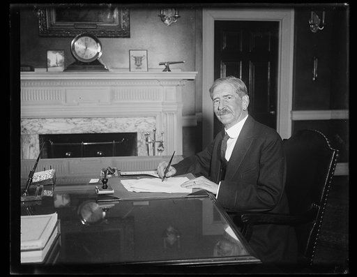 Claude Swanson at desk