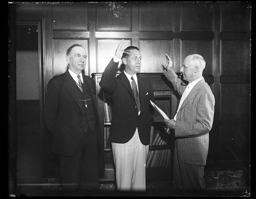 Daniel C. Roper, left; at swearing-in