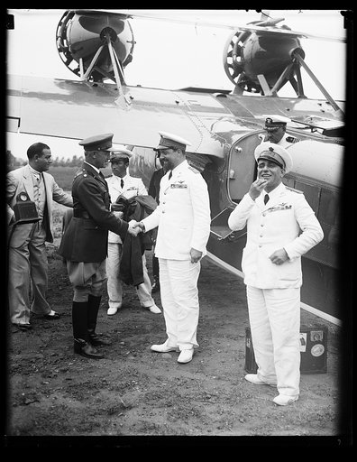 Military officers at airplane