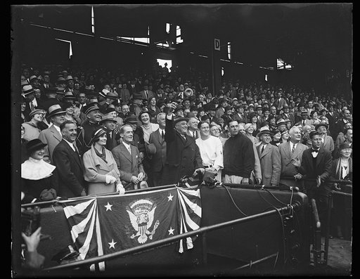 Franklin D. Roosevelt throwing out ball at baseball game