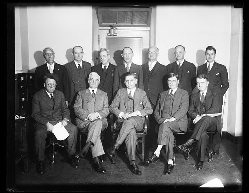 Group: Edward Stettinius, Jr., front row, 2nd from left