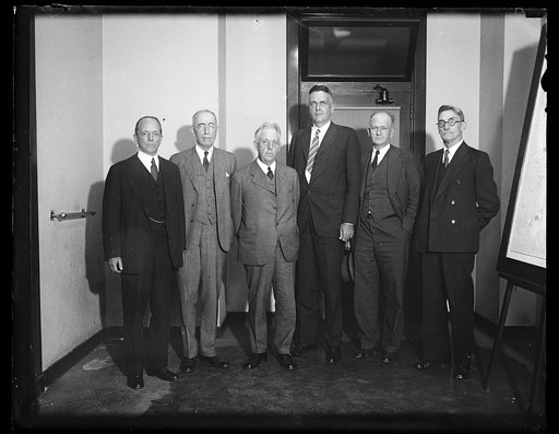 Group: William D. Mitchell, left