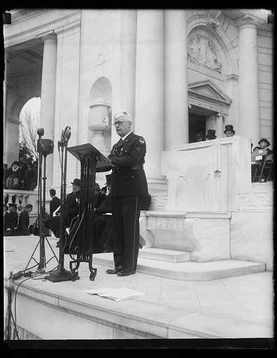 Man speaking at amphitheater, Arlington National Cemetery, Arlington, Virginia