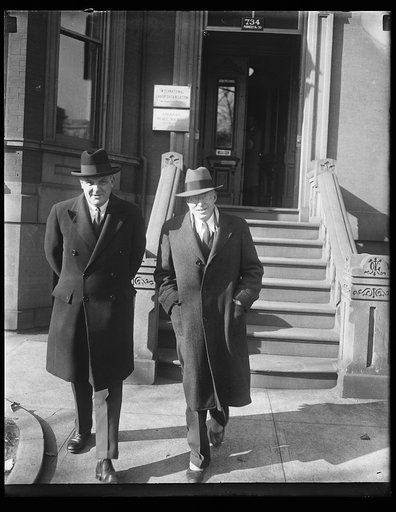 Unidentified men in front of International Labor Organization/American Peace Society Building