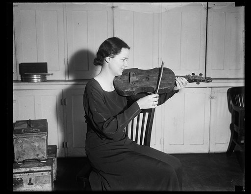 Woman with old string instrument