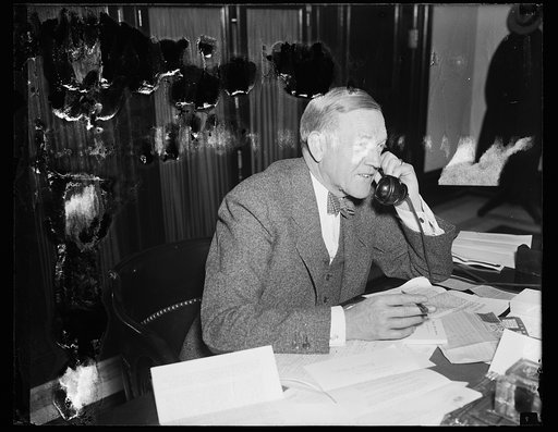 Charles L. McNary at desk