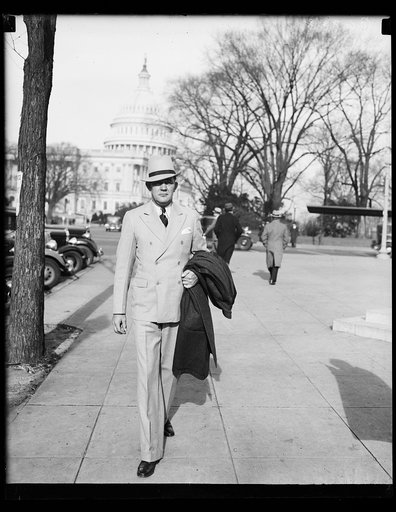 Man; U.S. Capitol in background. Washington, D.C.