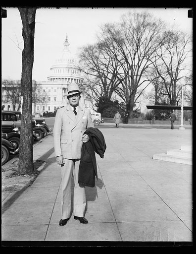 Man; U.S. Capitol in background. Washington, D.C.