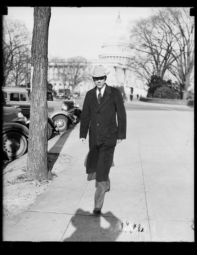 Man; U.S. Capitol in background. Washington, D.C.