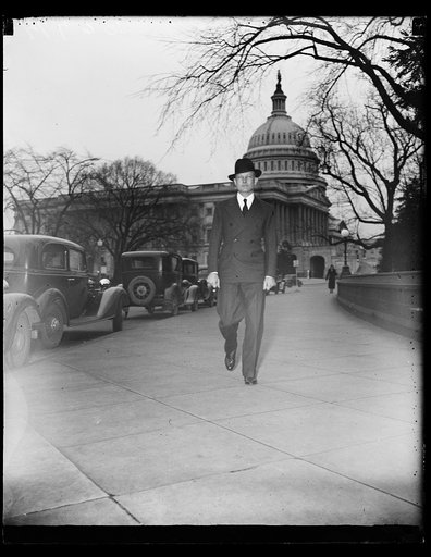 Man; U.S. Capitol in background. Washington, D.C.
