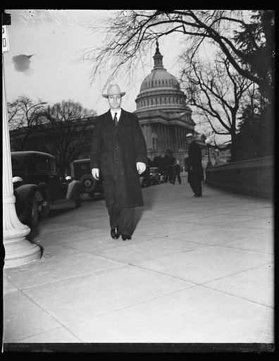Man; U.S. Capitol in background. Washington, D.C.