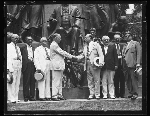 Group in front of Samuel Gompers memorial: Santiago Iglesias, Resident Commissioner of Puerto Rico, 3rd from left, William Green, center, facing right, and John L. Lewis, right