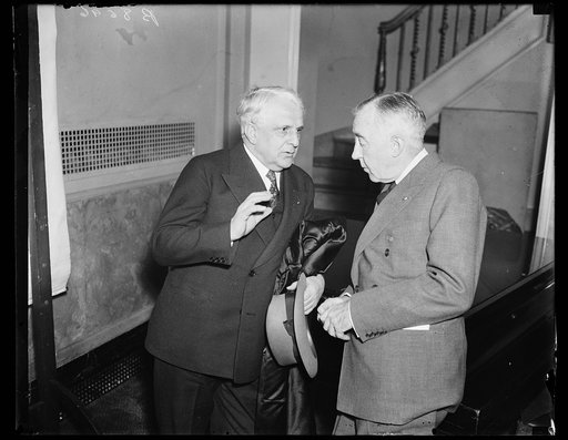 James J. Davis, left