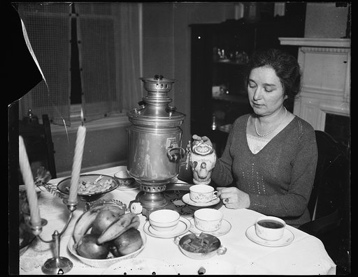Woman pouring coffee or tea