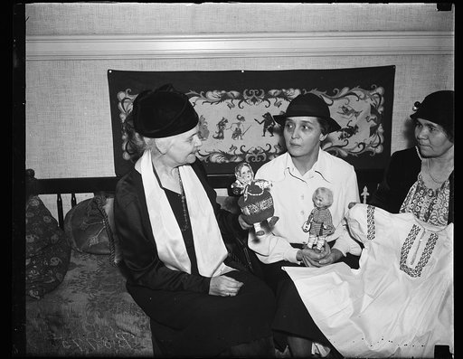 Women with dolls