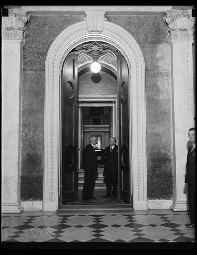 Men in doorway at U.S. Capitol, Washington, D.C.