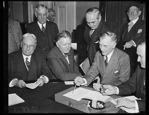 Group; Hiram Johnson, left, William Borah, center; J. Hamilton Lewis, back right
