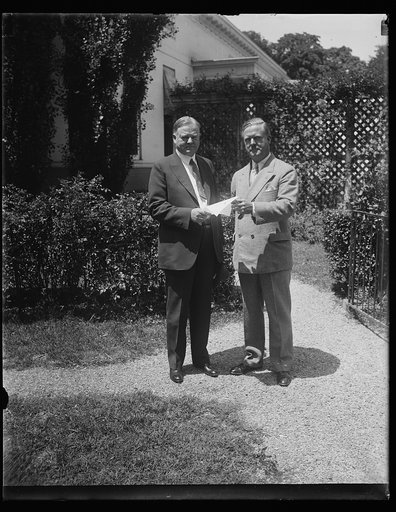 Herbert Hoover, left; outside White House, Washington, D.C.
