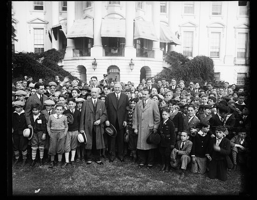 Herbert Hoover and group of children outside White House, Washington, D.C.