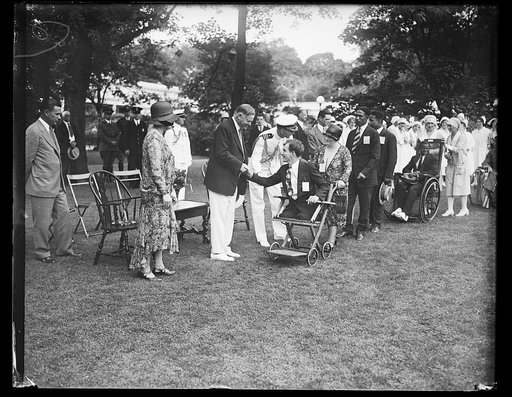 Herbert Hoover and wounded persons at White House, Washington, D.C.