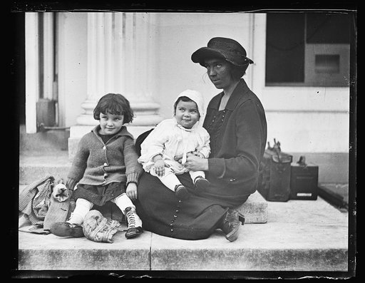 Woman with children. White House?