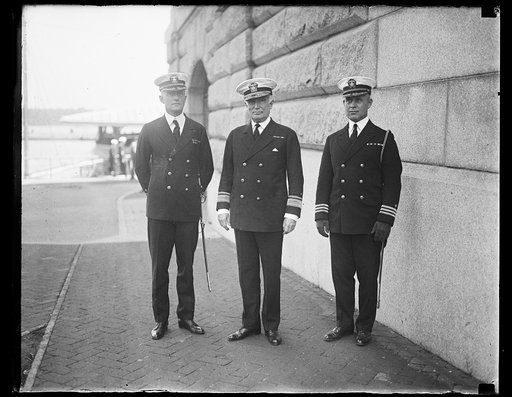 Naval officers; Henry B. Wilson, center