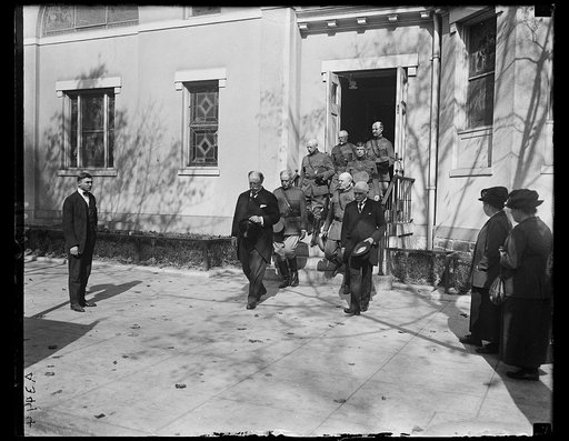 Group leaving church; William H. Taft, front left, Joseph Byrns?, front right