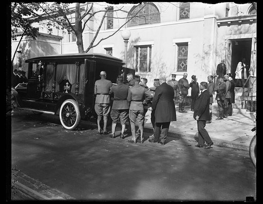 Placing casket in hearse