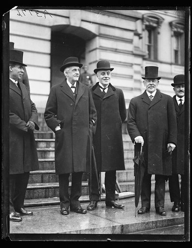 Men at U.S. Capitol; Sir Auckland Geddes, center. Washington, D.C.
