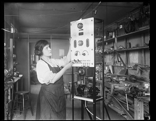 Woman with scientific instrument?