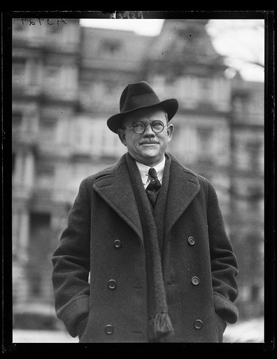 Man; State, War and Navy Building in background. Washington, D.C.