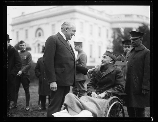 Warren Harding greets wounded soldier at White House, Washington, D.C.