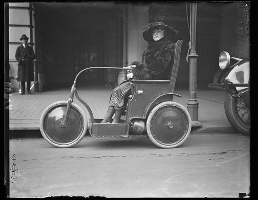 Person in three-wheeled vehicle