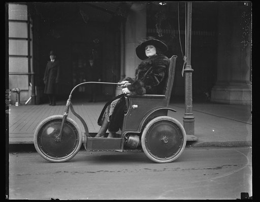 Person in three-wheeled vehicle