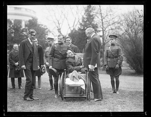 Warren Harding greets wounded soldier at White House, Washington, D.C.