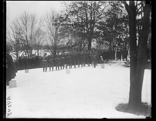Cemetery ceremony, snow