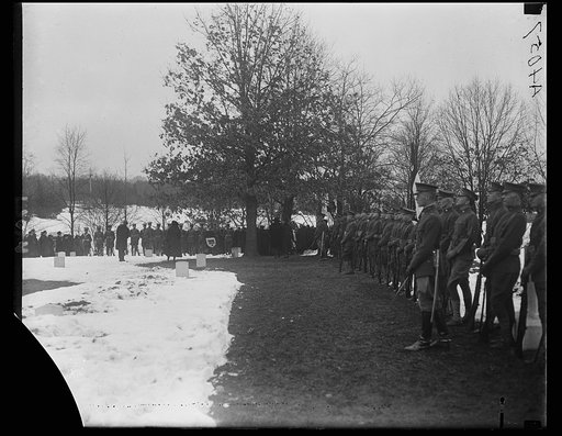 Cemetery ceremony, snow