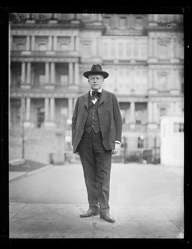 White House visitor; State, War and Navy Building in background. Washington, D.C.