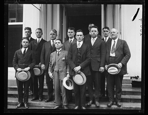 James J. Davis, 4th from left, with group