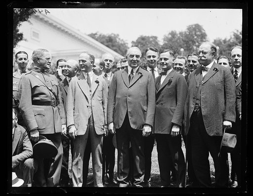 Group outside White House: includes John J. Pershing, right, Warren Harding, center, and William H. Taft, left