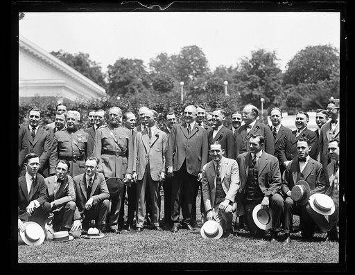 Group outside White House: includes John J. Pershing, right, Warren Harding, center, and William H. Taft, left