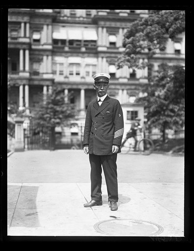 Visitor at White House; State, War and Navy Building in background. Washington, D.C.