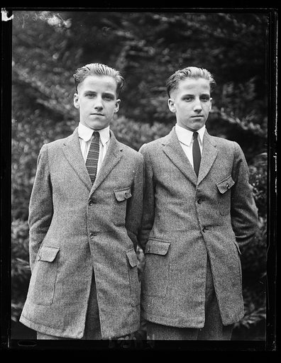 J. Walter Lang (left) and Francis Lang, 17 yr. old twins of Manchester, Ohio, who narrowly escaped death on the steamer Island Queen on its trip from Cincinnati to Point Pleasant, Ohio on Grant's Centennial. They were members of the boys' band that was to play for the Pres.