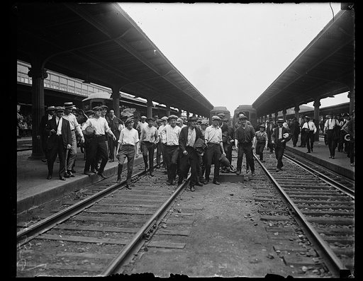 People at train tracks