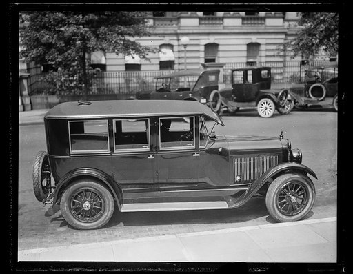 Automobile; State, War and Navy Building in background. Washington, D.C.