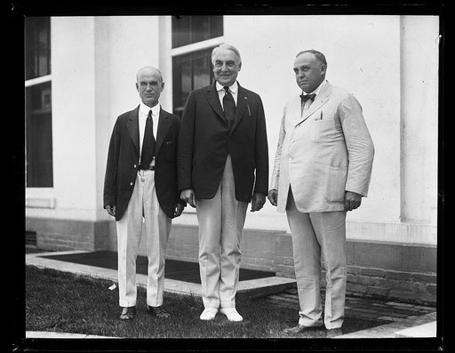 Pres. Harding with Simeon D. Fess (left) and Col. Carmi A. Thompson (right) [White House, Washington, D.C.