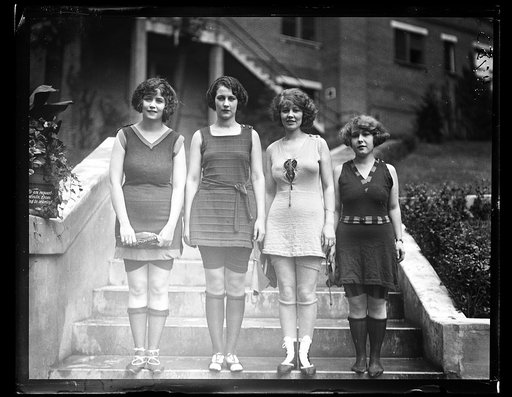 Miss Washington, Evelyn C. Lewis (second from left), in bathing suit with others at Wardman Park Hotel pool