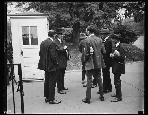 Charles G. Dawes and group at White House gate. Washington, D.C.
